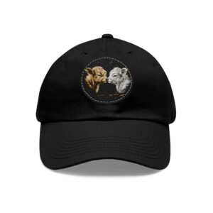 Two baby highland cows on hat